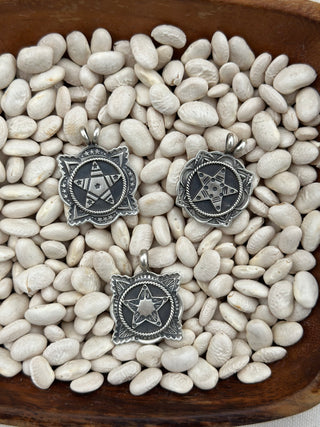 The Badge Pendants